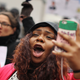 Demonstrators rally outside the Federal Communications Commission building to protest against the end of net neutrality rules Dec. 14, 2017, in Washington, D.C.